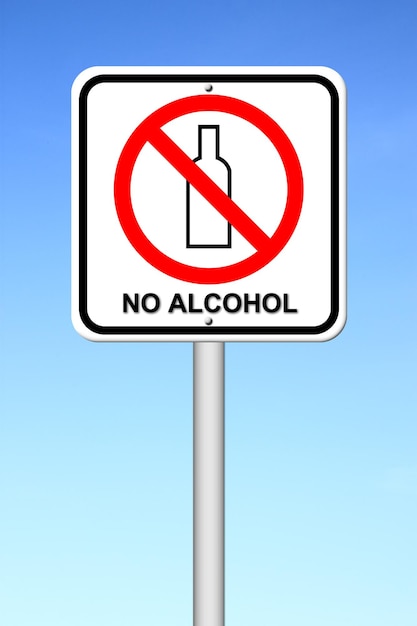 Photo low angle view of road sign against blue sky