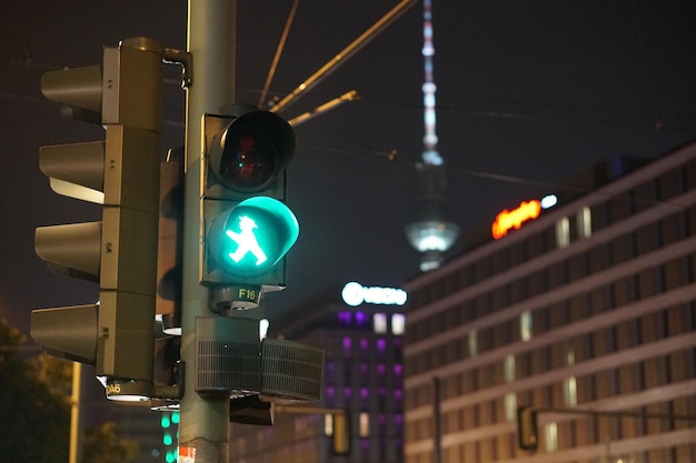 Low angle view of road signal at night
