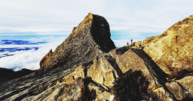 Low angle view of rock against sky