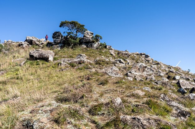 Low angle view of rock formation against clear sky