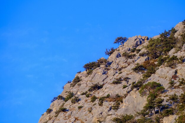 Low angle view of rock formation against sky