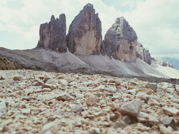 Low angle view of rock formations against sky