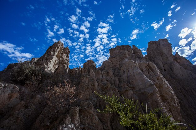 Low angle view of rock formations against sky