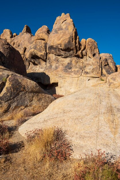 Low angle view of rock formations against sky