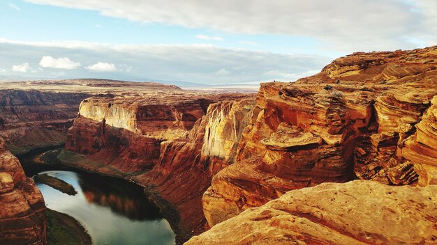 Low angle view of rock formations against sky