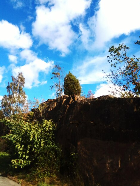 Low angle view of rocks against sky