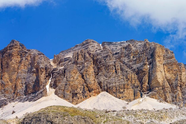 Low angle view of rocks on mountain against sky