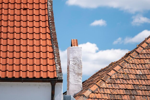 Low angle view of roof and building against sky