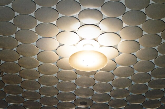 Low angle view of round ceiling lights