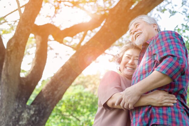 Low angle view of senior couple at park