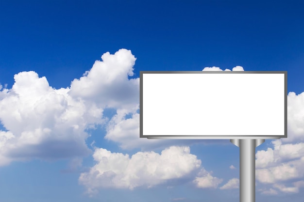 Low angle view of a sign against blue sky