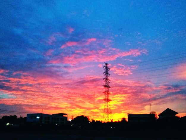 Low angle view of silhouette buildings against sky during sunset