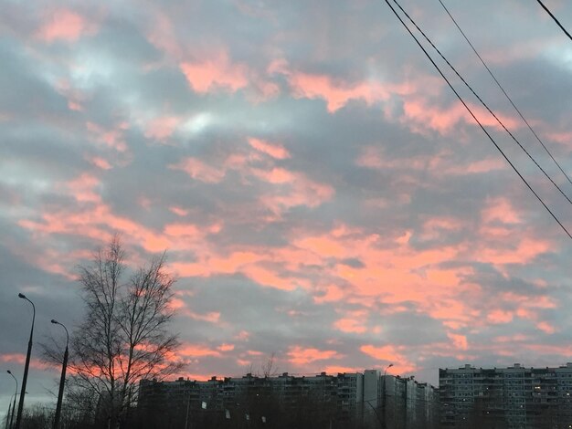 Low angle view of silhouette buildings against sky during sunset