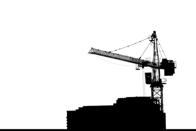 Photo low angle view of silhouette crane against clear sky
