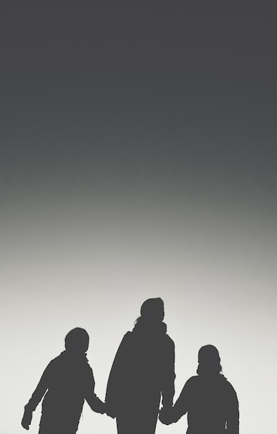 Low angle view of silhouette people against clear sky