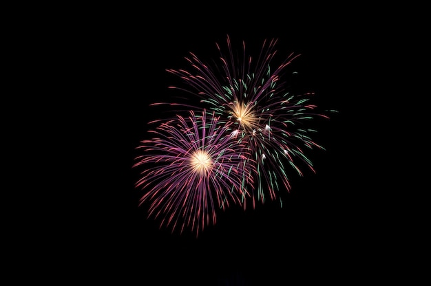 low angle view of sky illumed with fire crackers