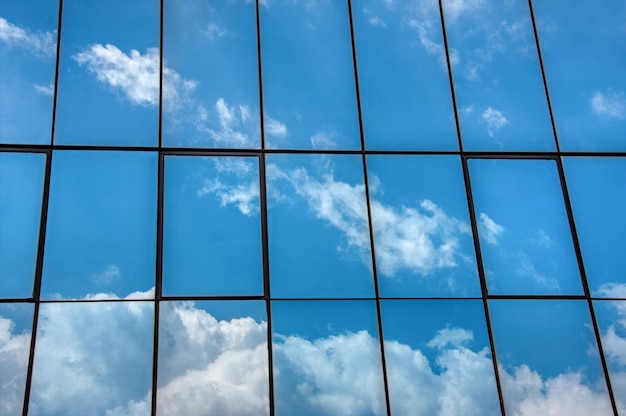 Low angle view of sky seen through glass window