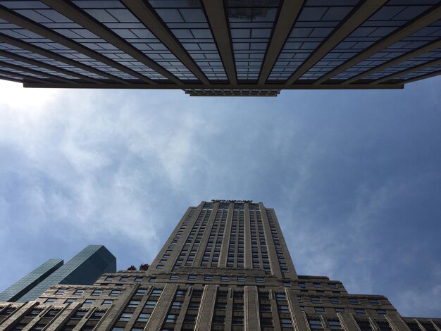 Low angle view of skyscraper against sky