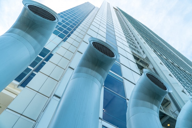 Low angle view of a skyscraper with tubes