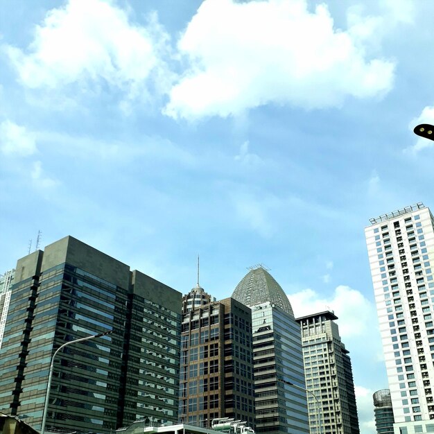 Low angle view of skyscrapers against sky