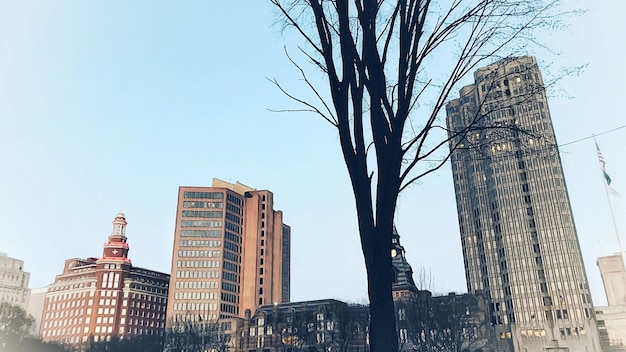 Low angle view of skyscrapers against sky