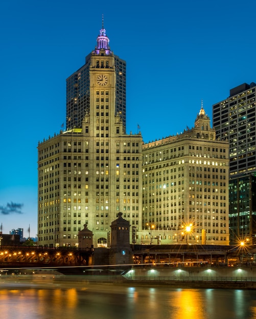 Low angle view of skyscrapers lit up at night