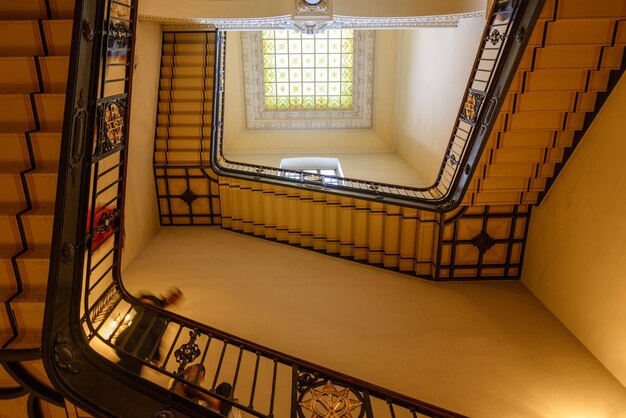 Low angle view of spiral staircase in building