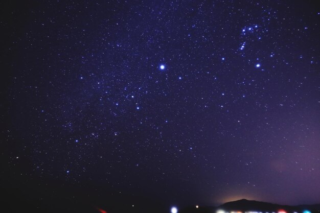 Low angle view of stars in sky at night