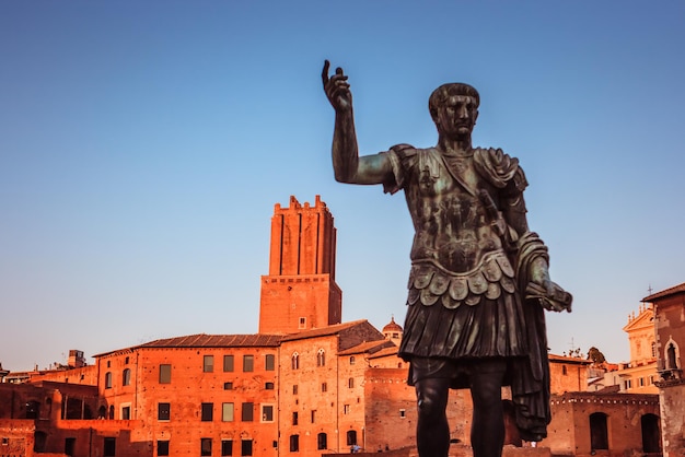 Low angle view of statue against clear blue sky