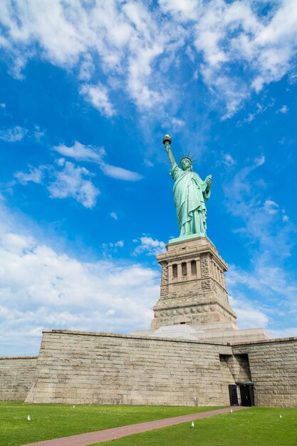 Low angle view of statue against cloudy sky