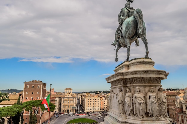 Low angle view of statue against sky in city