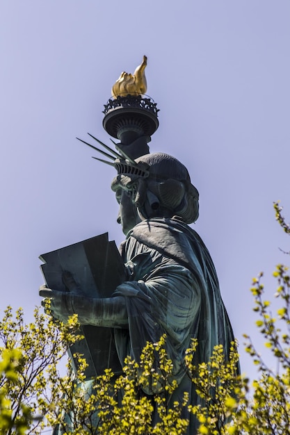 Low angle view of statue against sky