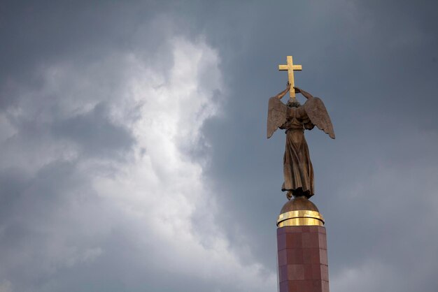 Low angle view of statue against sky