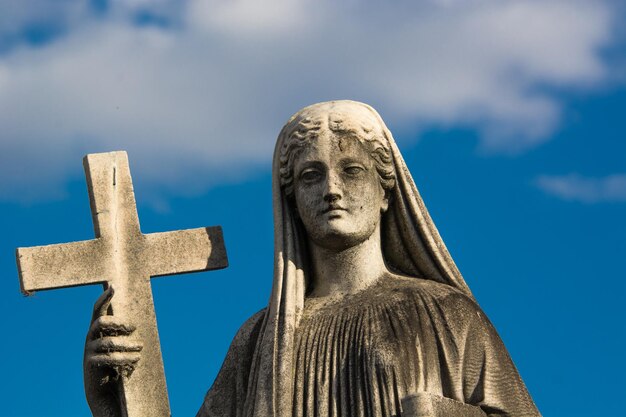 Low angle view of statue against sky