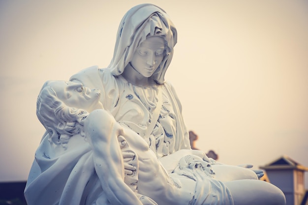 Low angle view of statue against sky