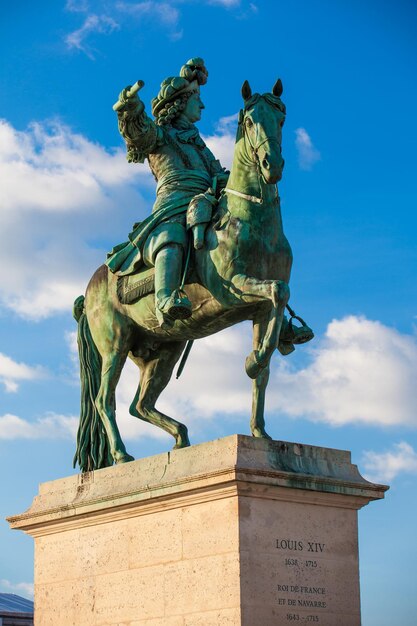 Low angle view of statue against sky