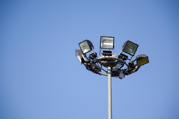 Low angle view of street light against clear blue sky