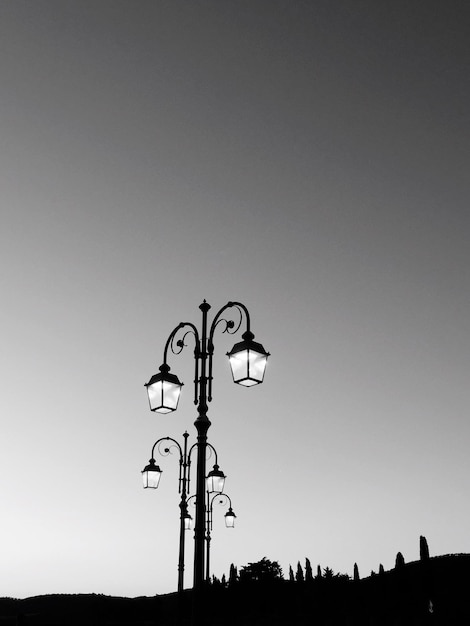 Low angle view of street light against clear sky