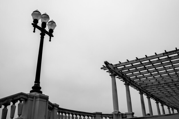 Low angle view of street light against clear sky