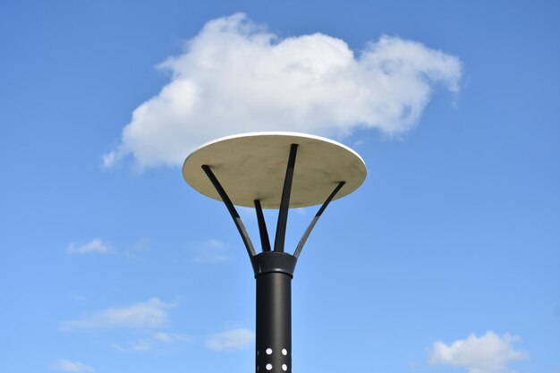 Low angle view of street light against sky