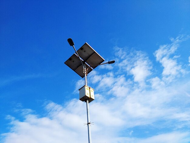 Low angle view of street light against sky