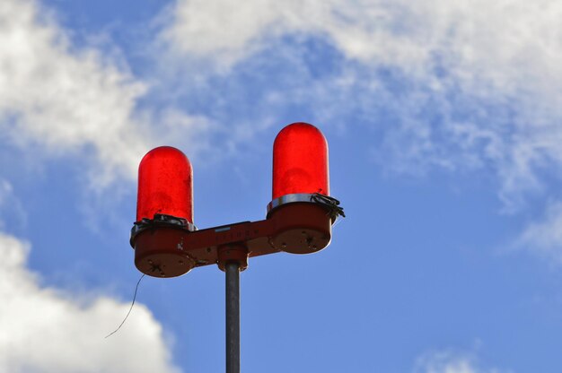 Low angle view of street light against sky