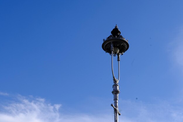 Low angle view of street light against sky