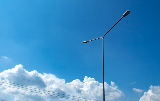 Low angle view of street light against sky