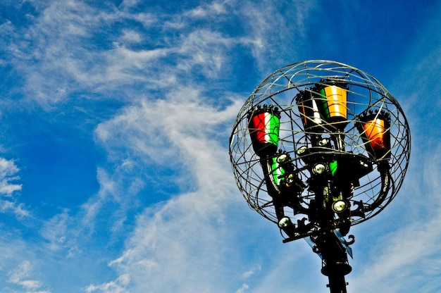 Low angle view of street light against sky