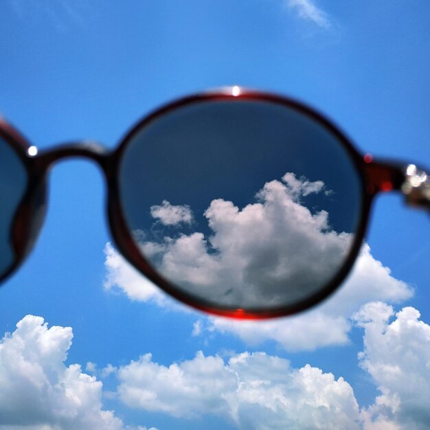 Low angle view of sunglasses against sky