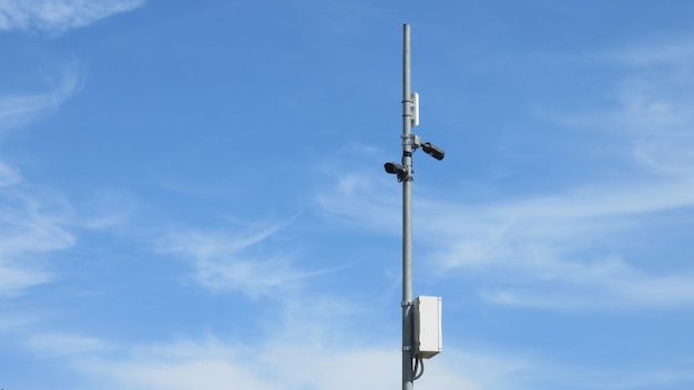 Low angle view of telephone pole against sky