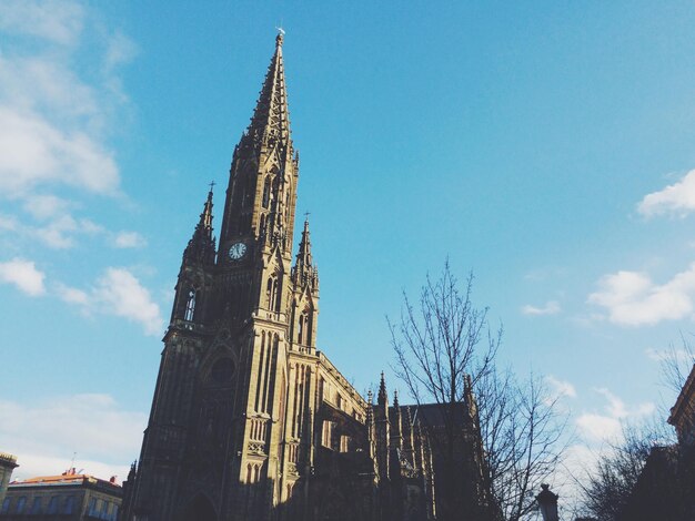 Low angle view of temple against blue sky