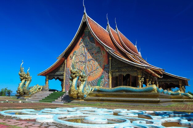 Low angle view of temple against building