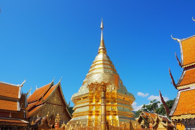 Low angle view of temple building against clear blue sky